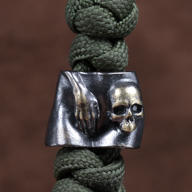 Hand Skull Head Brass Knife Be - Paracord Survival Bracelet recensione e prezzo